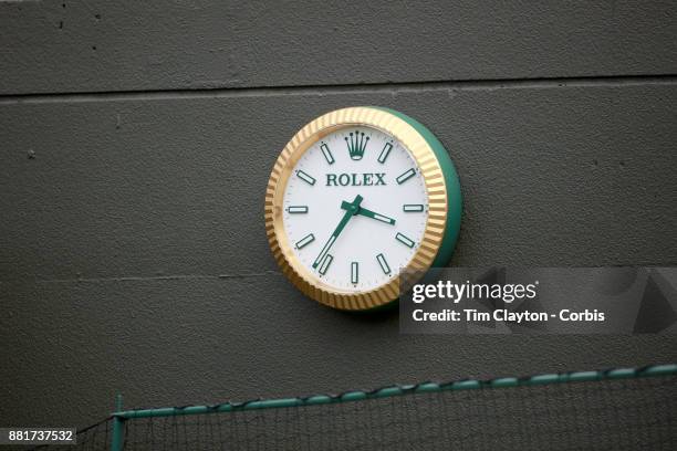Rolex clock on the wall of NO.1 Court during the Wimbledon Lawn Tennis Championships at the All England Lawn Tennis and Croquet Club at Wimbledon on...