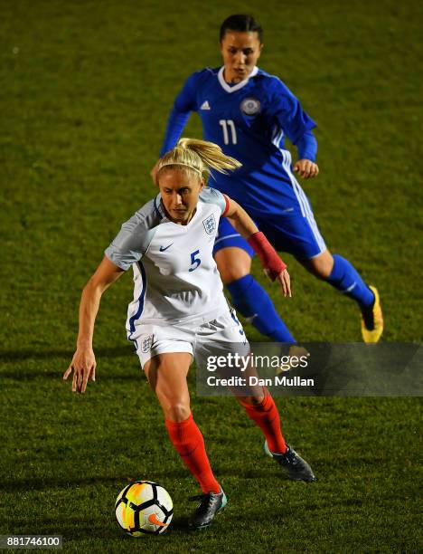 Stephanie Houghton of England holds off Saule Karibayeva of Kazakhstan during the FIFA Women's World Cup Qualifier between England and Kazakhstan at...