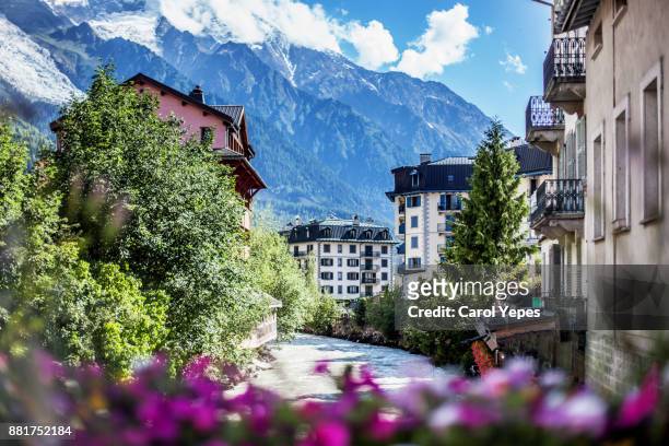 view of chamonix-mont blanc village and french alps - aiguille du midi stock pictures, royalty-free photos & images