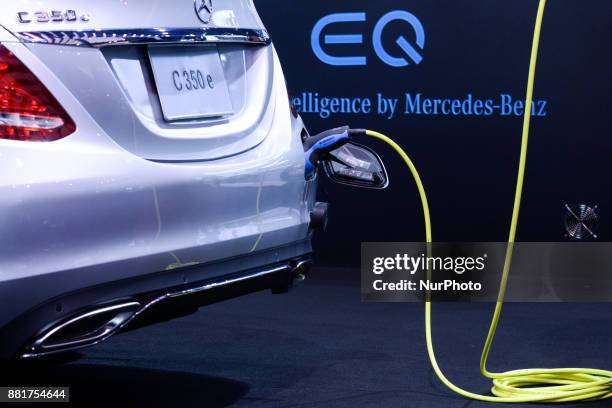 Charging plug of an electric Mercedes-Benz C350e car on display during The 34th Thailand International Motor Expo 2017 at Muang Thong Thani in...