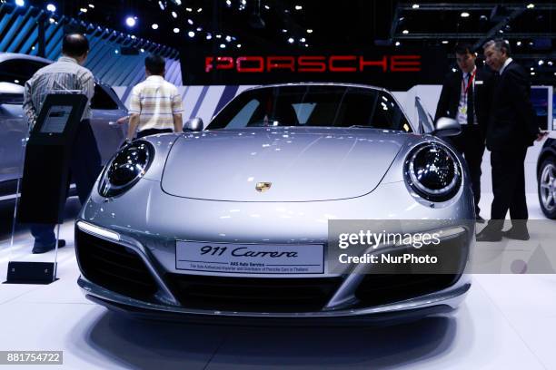 Porsche 911 Carrera car on display during The 34th Thailand International Motor Expo 2017 at Muang Thong Thani in Bangkok, Thailand. 29 November 2017