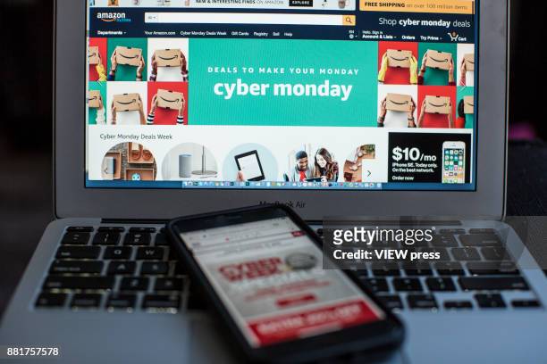 In this photo illustration, Amazon advertise Cyber Monday sales on it's company websites on November 27, 2017 in Guttenberg, New Jersey. Americans...