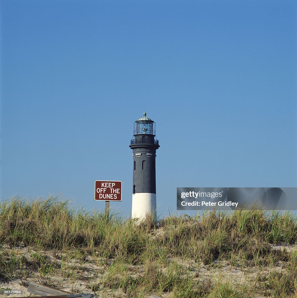 Lighthouse with sign