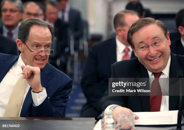 Barry Lee Myers sits with Sen. Pat Toomey , during his Senate Commerce, Science and Transportation Committee confirmation hearing to become...