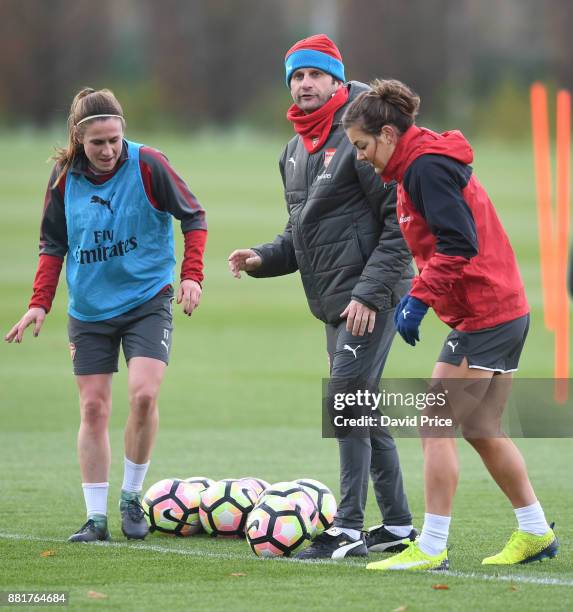 Arsenal Women's Manager Joe Montemurro with Heather O'Reilly and Jemma Rose during the Arsenal Womens Training Session at London Colney on November...