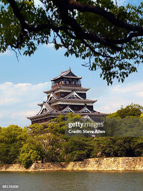 replica of hiroshima castle, hiroshima, japan - hiroshima castle stock pictures, royalty-free photos & images