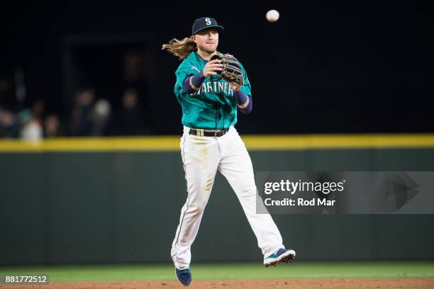 Taylor Motter of the Seattle Mariners throws to first during the game against the Texas Rangers at Safeco Field on Friday, April 14, 2017 in Seattle,...