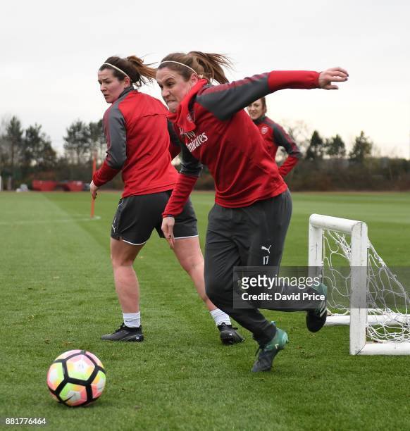 Emma Mitchell and Heather O'Reilly of Arsenal Women during the Arsenal Womens Training Session at London Colney on November 29, 2017 in St Albans,...