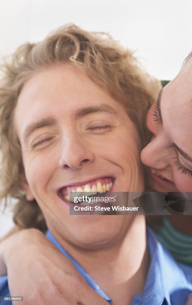 Smiling man and woman