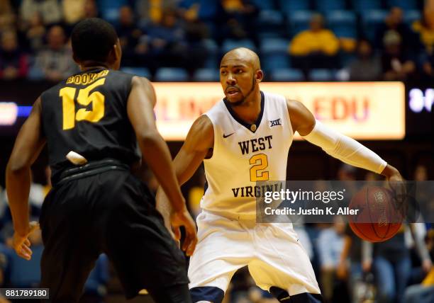 Jevon Carter of the West Virginia Mountaineers in action against the Long Beach State 49ers at the WVU Coliseum on November 20, 2017 in Morgantown,...