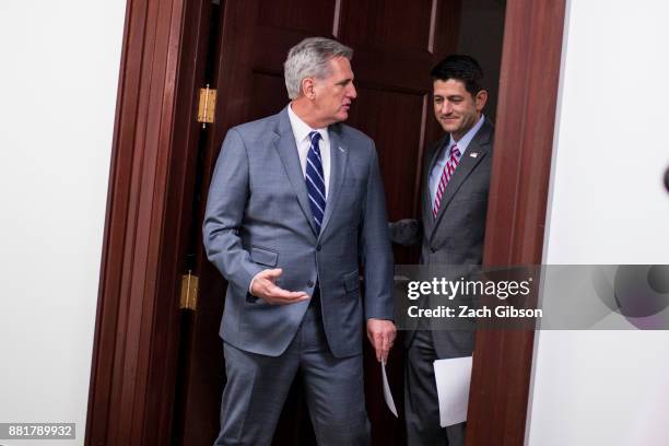 House Majority Leader Kevin McCarthy , left, and House Speaker Paul Ryan walk to a press conference on Capitol Hill, November 29, 2017 in Washington,...