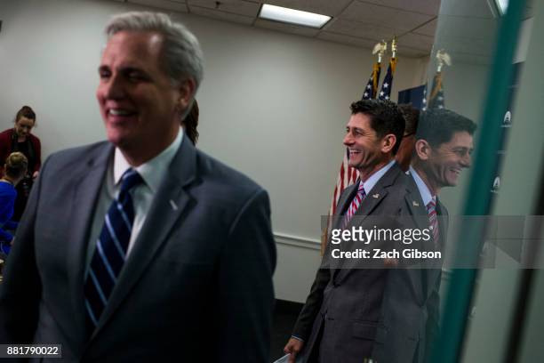 House Speaker Paul Ryan right, and House Majority Leader Kevin McCarthy , left, leave a press conference on Capitol Hill, November 29, 2017 in...