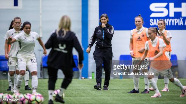 Head Coach Anouschka Bernhard of Germany acts during warm-up prior to the U17 Girls friendly match between Finland and Germany at the Eerikkila Sport...
