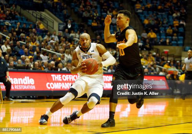 Jevon Carter of the West Virginia Mountaineers in action against the Long Beach State 49ers at the WVU Coliseum on November 20, 2017 in Morgantown,...