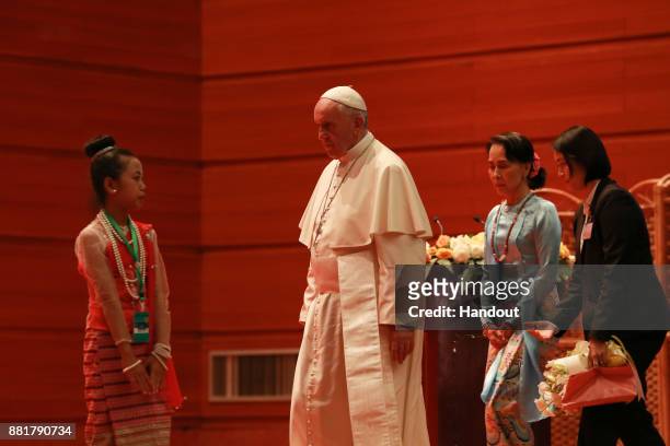 Pope Francis and Myanmar's civilian leader Aung San Suu Kyi attend an event on November 28, 2017 in Naypyidaw, Burma. Thousands of Catholics have...
