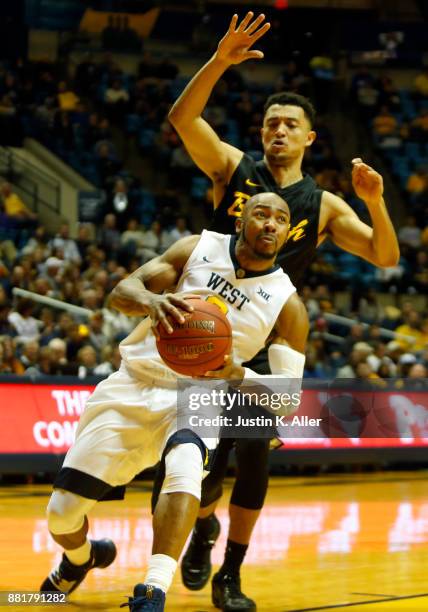 Jevon Carter of the West Virginia Mountaineers in action against the Long Beach State 49ers at the WVU Coliseum on November 20, 2017 in Morgantown,...