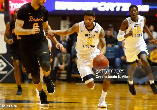 James Bolden of the West Virginia Mountaineers in action against the Long Beach State 49ers at the WVU Coliseum on November 20, 2017 in Morgantown,...