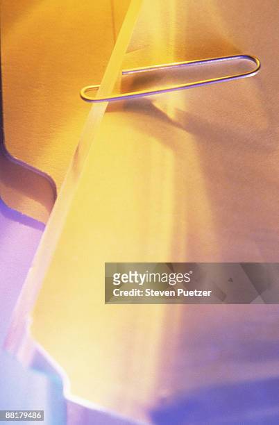 paper clip and manila envelope - manila envelope stock pictures, royalty-free photos & images