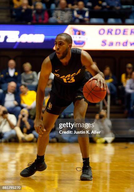 Barry Ogalue of the Long Beach State 49ers in action against the West Virginia Mountaineers at the WVU Coliseum on November 20, 2017 in Morgantown,...