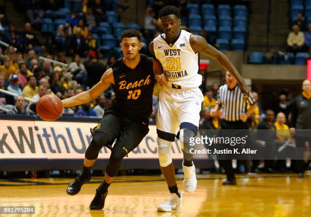 Bryan Alberts of the Long Beach State 49ers in action against the West Virginia Mountaineers at the WVU Coliseum on November 20, 2017 in Morgantown,...