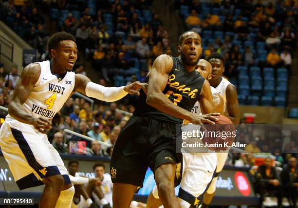 Barry Ogalue of the Long Beach State 49ers in action against the West Virginia Mountaineers at the WVU Coliseum on November 20, 2017 in Morgantown,...