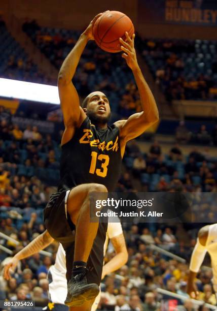 Barry Ogalue of the Long Beach State 49ers in action against the West Virginia Mountaineers at the WVU Coliseum on November 20, 2017 in Morgantown,...