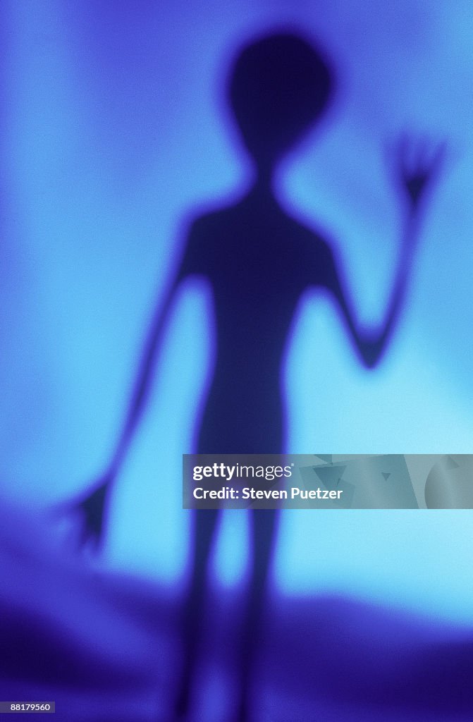 Alien Waving High-Res Stock Photo - Getty Images