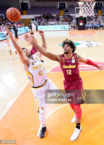 Jarnell Stokes ££12 of ZJJN in action during the 2017/2018 CBA League match between Beijing Beikong Fly Dragons and ZJJN at Beijing Olympic Sports...