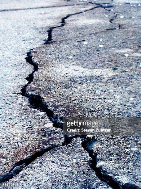 cracked asphalt - earthquake stock pictures, royalty-free photos & images