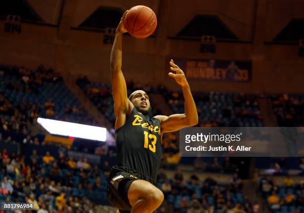 Barry Ogalue of the Long Beach State 49ers in action against the West Virginia Mountaineers at the WVU Coliseum on November 20, 2017 in Morgantown,...