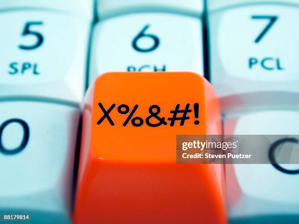 close up of orange button with symbols - hitting button stock pictures, royalty-free photos & images