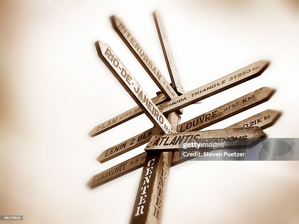 Sign With Arrows Pointing In Many Directions High-Res Stock Photo ...
