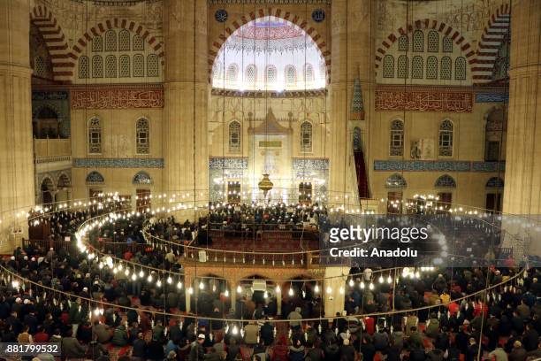 People gather at Selimiye Mosque during a religious ceremony within the celebrations for Mawlid Mawlid al-Nabi, the birth anniversary of Muslims'...