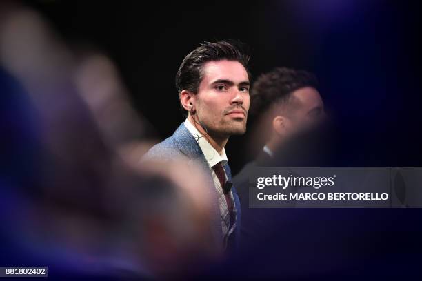 Title holder Tom Dumoulin of Netherlands looks on during the presentation of the 2018 Tour of Italy cycling race, on November 29, 2017 in Milan. /...