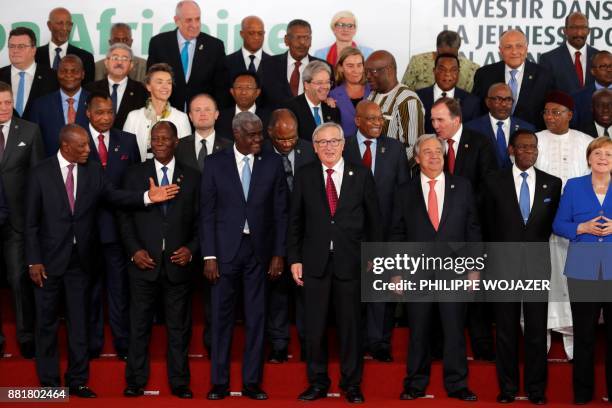 Guinea's President Alpha Conde, Ivory Coast President Alassane Ouattara, African Union Commission chairman Moussa Faki, European Commission President...