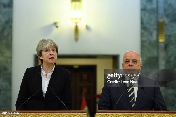 British Prime Minister Theresa May and Iraqi Prime Minister Haider Al-Abadi make statements to the media following a bi-lateral meeting in the...