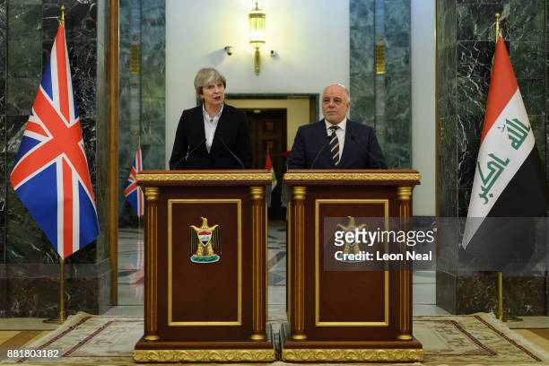 British Prime Minister Theresa May and Iraqi Prime Minister Haider Al-Abadi make statements to the media following a bi-lateral meeting in the...