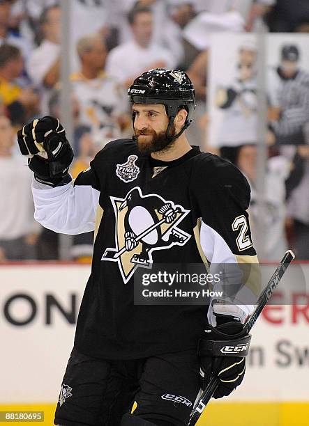 Maxime Talbot of the Pittsburgh Penguins reacts his empty netter against the Detroit Red Wings during Game Three of the 2009 NHL Stanley Cup Finals...