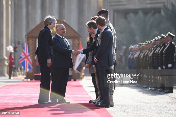 British Prime Minister Theresa May introduces Iraqi Prime Minister Haider Al-Abadi to members of the British delegation, ahead of a bi-lateral...