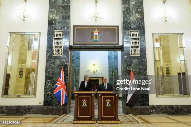 British Prime Minister Theresa May and Iraqi Prime Minister Haider Al-Abadi make statements to the media following a bi-lateral meeting in the...