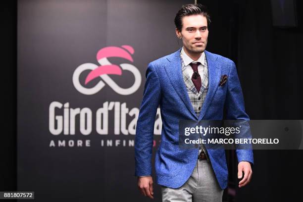 Giro's title holder Tom Dumoulin from Netherlands, attends the presentation of the 2018 Tour of Italy cycling race, on November 29, 2017 in Milan. /...