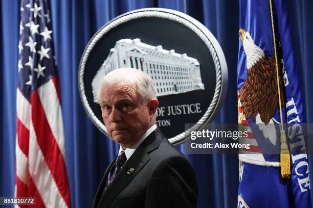 Attorney General Jeff Sessions listens during a news conference at the Justice Department November 29, 2017 in Washington, DC. Sessions announced the...