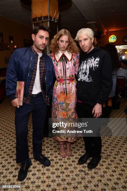 Kevin Tekinel, Petra Collins and Greg Krelenstein attend the release of Petra Collins: Coming of Age hosted by Gucci on November 28, 2017 in New York...