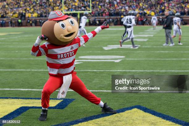 Ohio State mascot Brutus Buckeye celebrates a touchdown in the end zone during game action between the Ohio State Buckeyes and the Michigan...