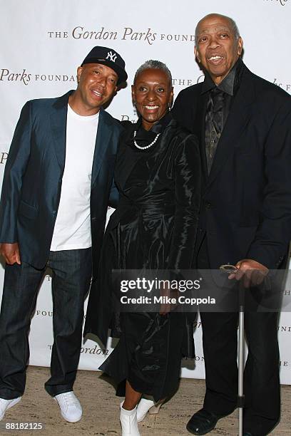 Record producer Russell Simmons, model Bethann Hardison and photographer Jeffrey Holder attend the Gordon Parks Foundation's Celebrating Fashion...