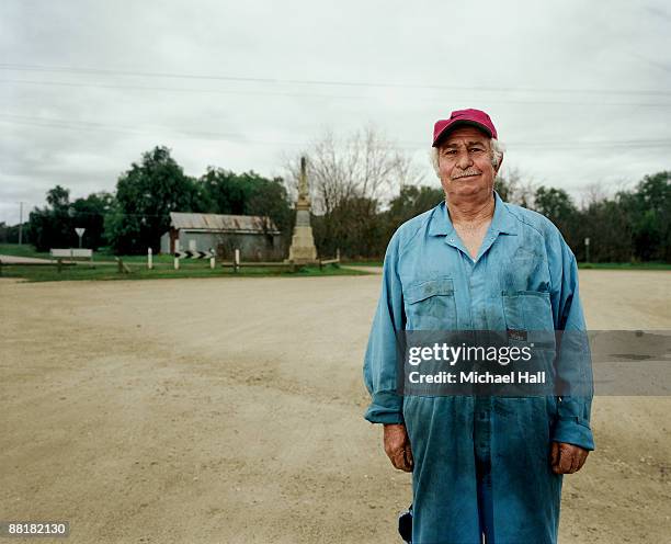 small town mechanic - looking at camera australia stock-fotos und bilder