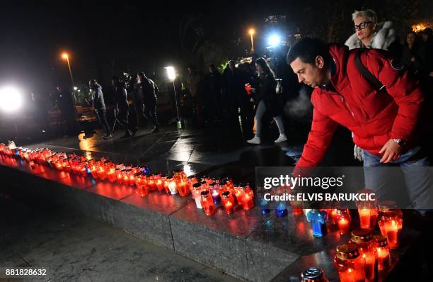 Bosnian Croats and residents of Mostar, light candles in in tribute to General Slobodan Praljak, in Mostar on November 29 after Bosnian Croat war...