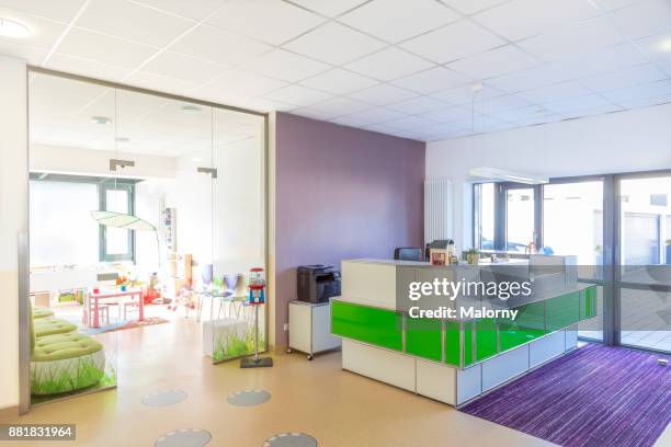 entrance area at a doctors office or dentists office. front desk and waiting room. - dental office front stock pictures, royalty-free photos & images