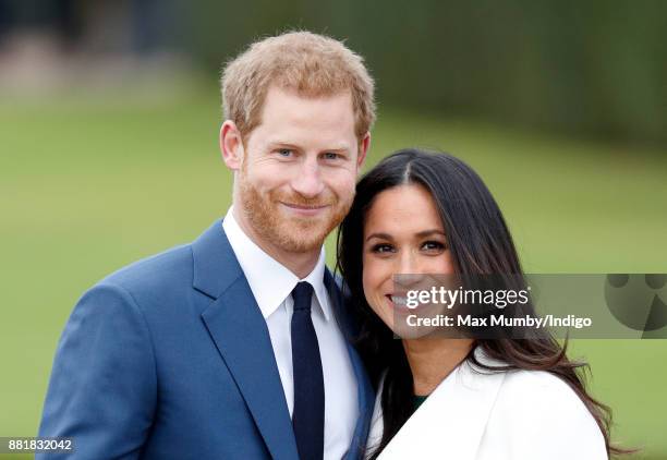 Prince Harry and Meghan Markle attend an official photocall to announce their engagement at The Sunken Gardens, Kensington Palace on November 27,...