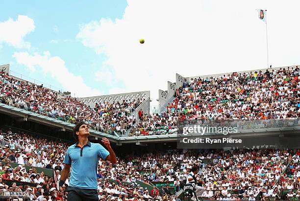 Roger Federer of Switzerland in action during the Men's Singles Fourth Round match against Tommy Haas of Germany on day nine of the French Open at...